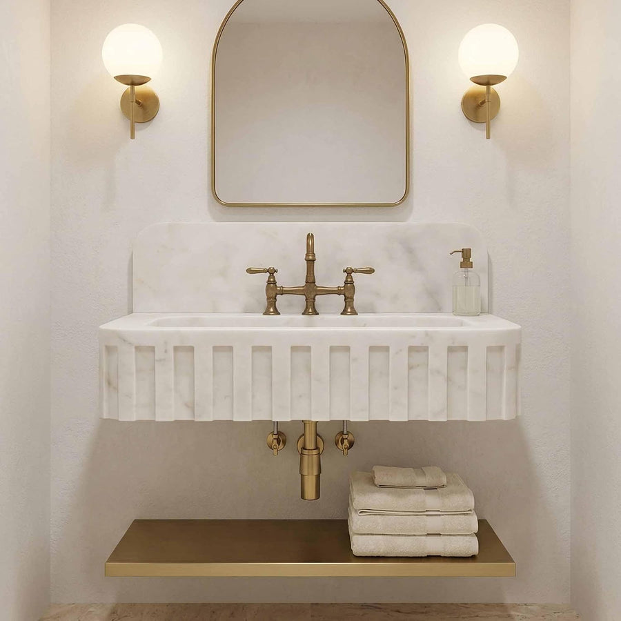 Carrara marble sink with backsplash for a powder room or primary bathroom vanity