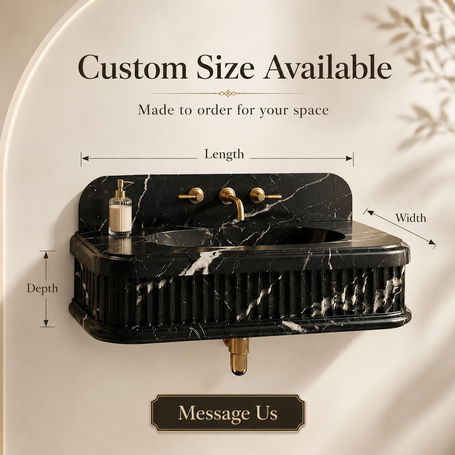 A black marble wall-mounted sink with gold faucet hardware, shown with dimension lines labeled length, width, and depth, plus text reading 'Custom Size Available' and 'Made to order for your space.'.