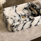 close view of hand carved marble sink