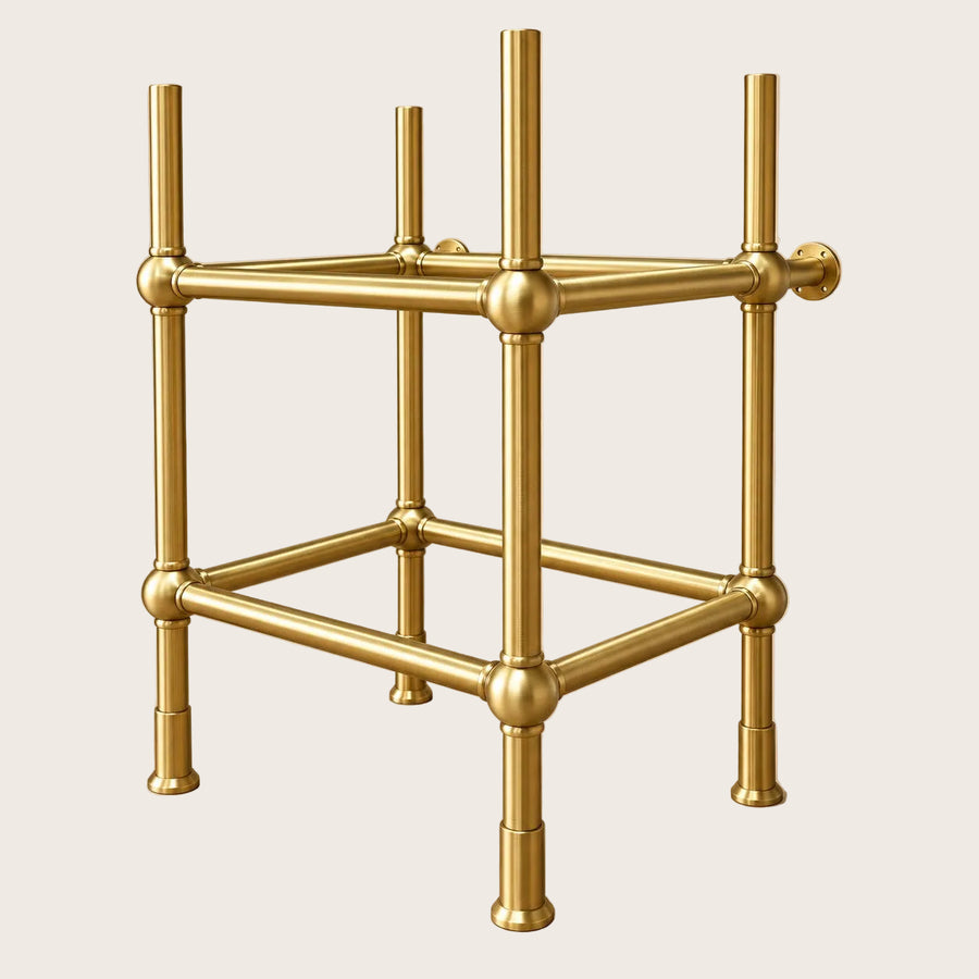 Handmade brass vanity sink stand shown as freestanding or wall-supported installation