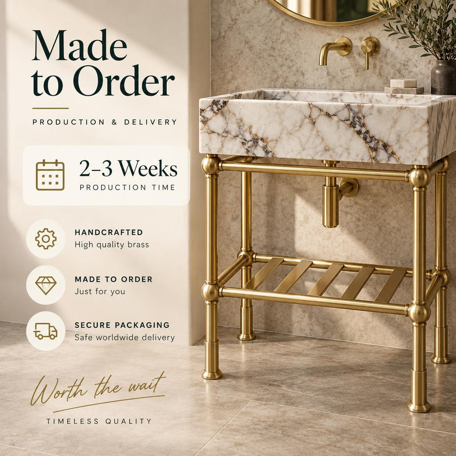 Handmade brass vanity sink stand shown as freestanding or wall-supported installation