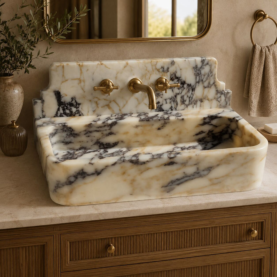 custom handmade marble sink in a farmhouse bathroom