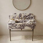 Calacatta Viola marble sink with backsplash on brass console legs
