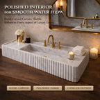 Marble sink with gold fixtures in a bathroom setting, featuring text about marble quality.