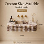 A freestanding rectangular sink with a fluted marble-look front, shown against a beige wall with gold faucet hardware. The image includes overlaid text reading 'Custom Size Available' and dimension labels for depth, width, and length, plus small decorative objects on top.