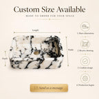 Close-up corner detail of black and white marble sink showing dramatic natural veining
