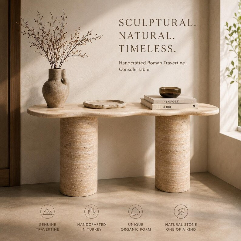 Handcrafted Roman Travertine console table with decorative items in a room setting.