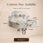 A wall-mounted marble sink with chrome faucet and plumbing hardware shown on a beige background, with text indicating customizable size and arrows labeling width, depth, and length.