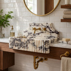 Fluted marble sink with backsplash in subway tile bathroom