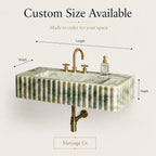 A freestanding rectangular sink with a ribbed green-and-white marbled stone body and brass faucet hardware, shown with dimension arrows labeled width, length, and depth, plus text stating custom size available.