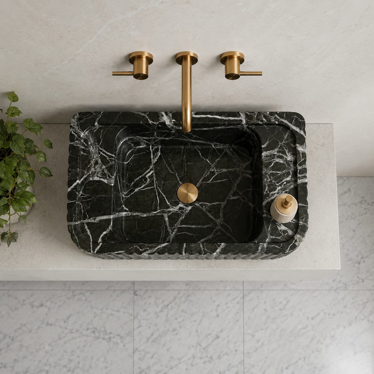 Top view of Green Levanto marble sink with white veining on white countertop