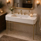 Bathroom with a modern marble sink and mirror on a wall.