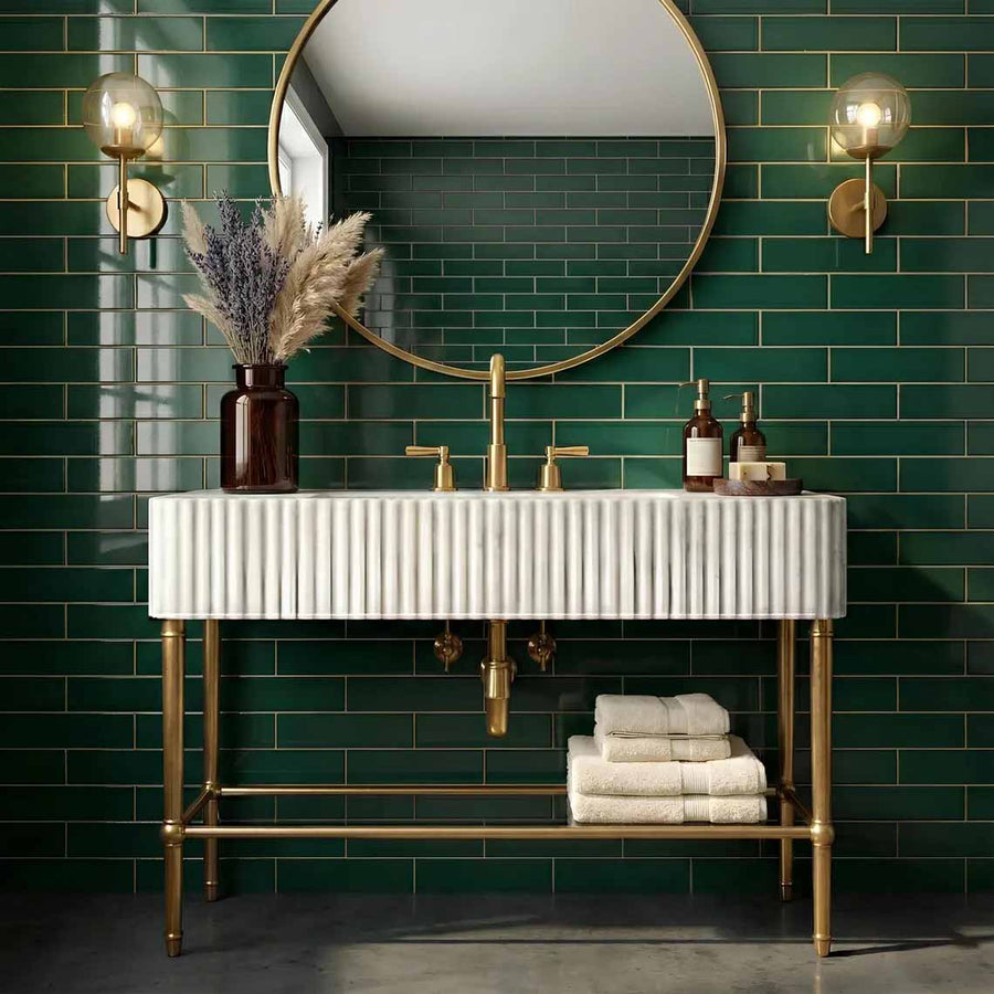 Bathroom with a modern sink and round mirror on a neutral wall.