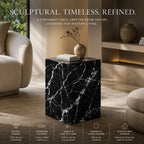 Black marble side table in a modern living room setting with text describing its qualities.