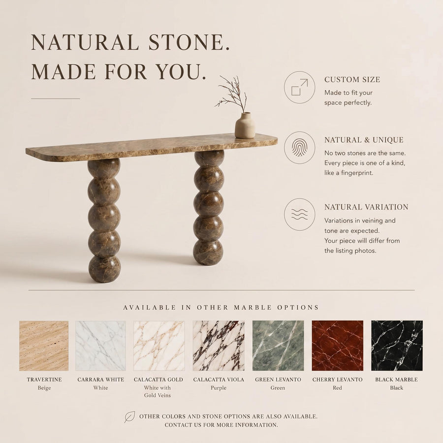 Handcrafted marble console table featuring sculptural stacked sphere legs and a rounded rectangular marble top. Luxury natural stone entryway table designed for organic modern, contemporary, minimalist, and high-end interiors. Elegant marble hallway furniture with rich natural veining, ideal as a sofa table, foyer table, or statement console for luxury home decor.