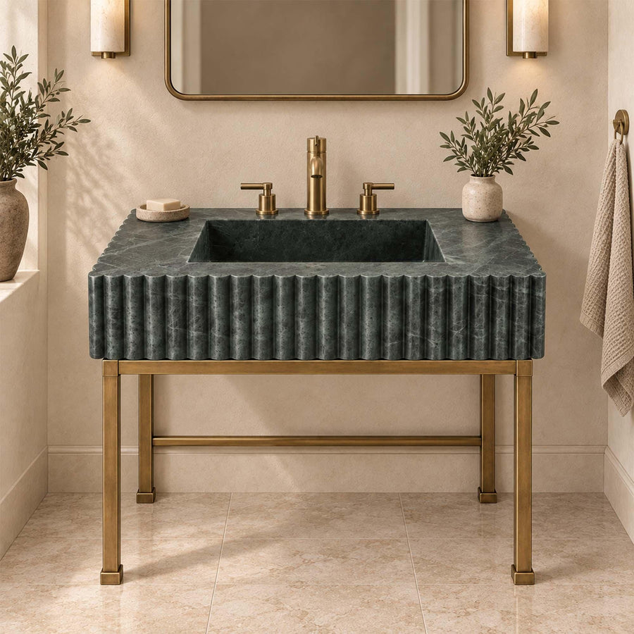 Side view of green marble console sink showing continuous vertical fluting