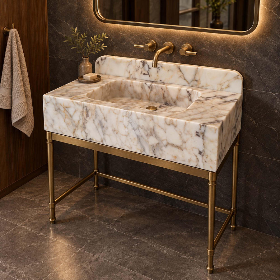 Calacatta Gold smooth console sink detail showing hand-carved edges