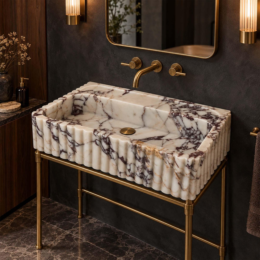 Close-up of natural veining on a Calacatta Viola fluted floating sink