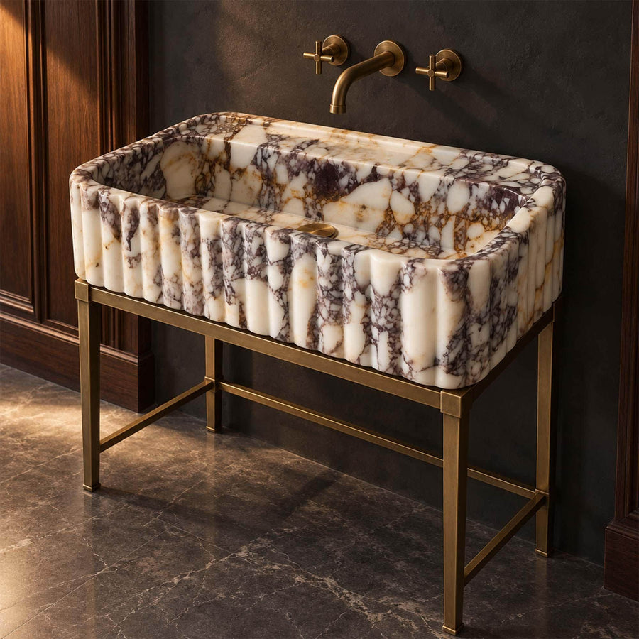 Calacatta Viola rounded fluted floating sink in a luxury bathroom