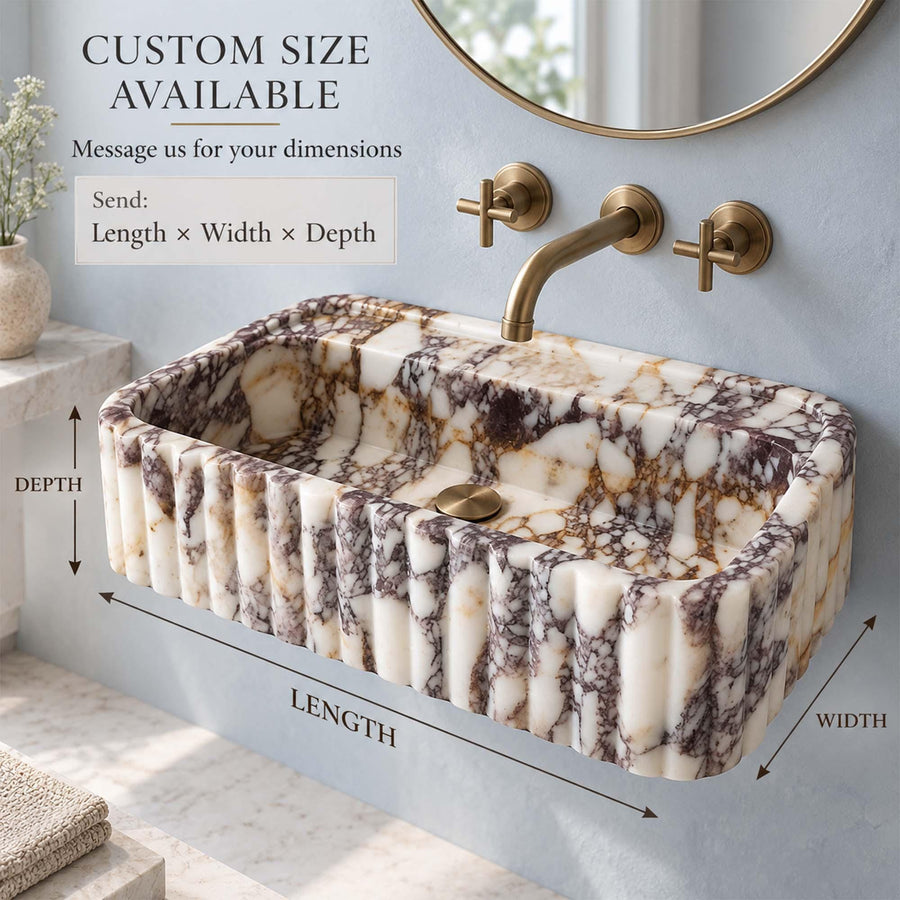 Close-up of natural veining on a Calacatta Viola rounded fluted sink