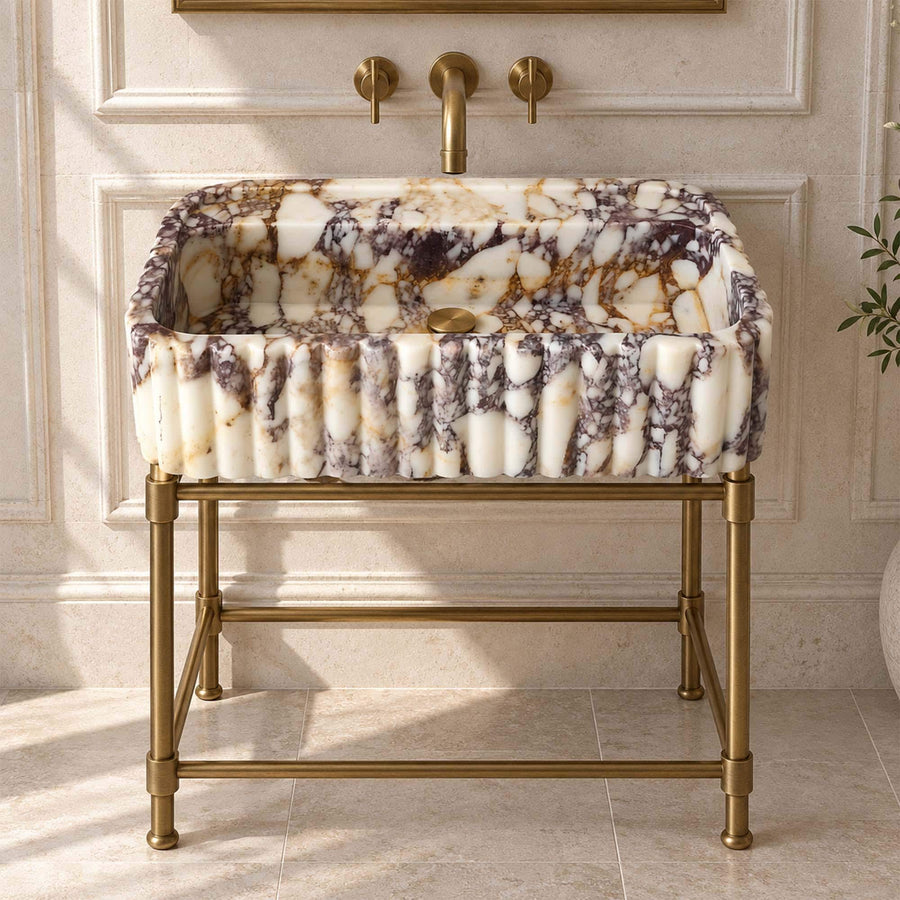 Calacatta Viola rounded fluted sink detail showing hand-carved edges