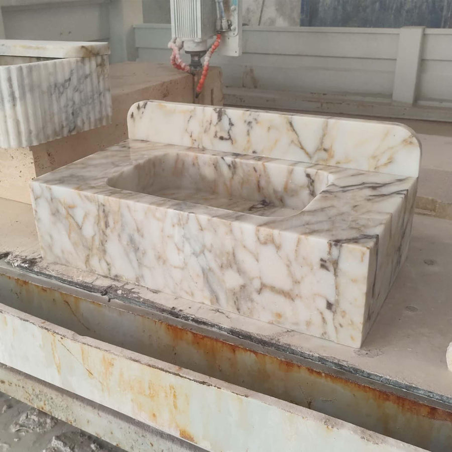 Calacatta Gold smooth console sink with rounded backsplash, made to order in custom sizes