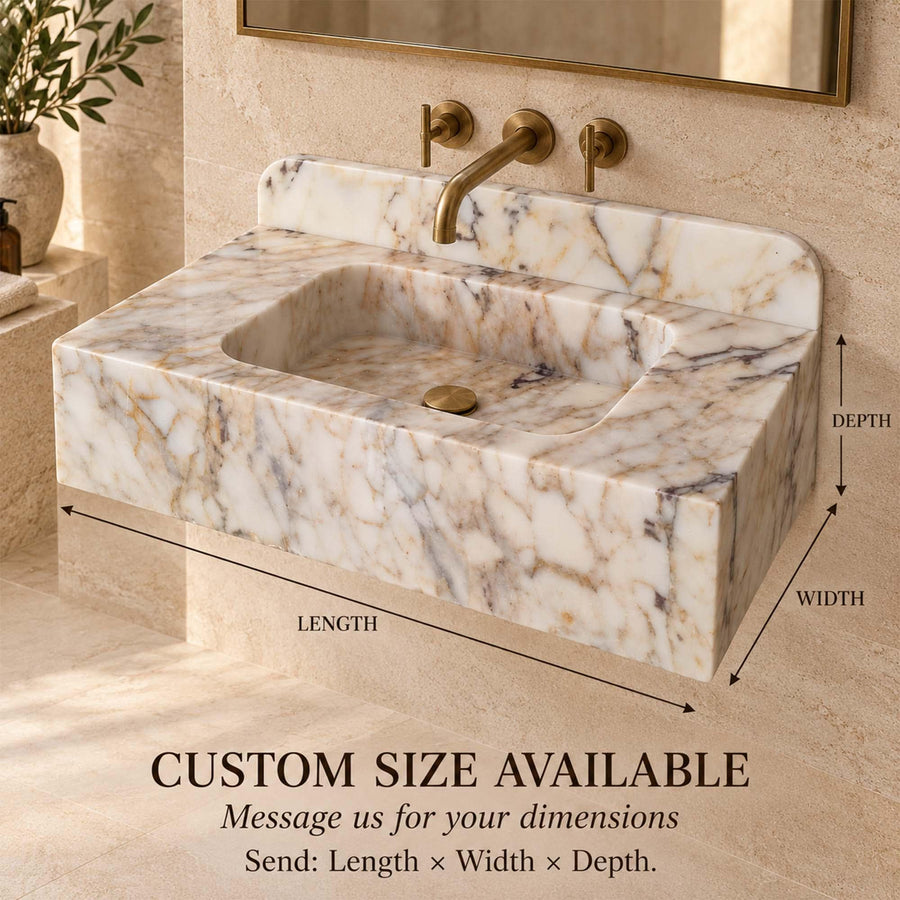 Close-up of natural veining on a Calacatta Gold smooth console sink