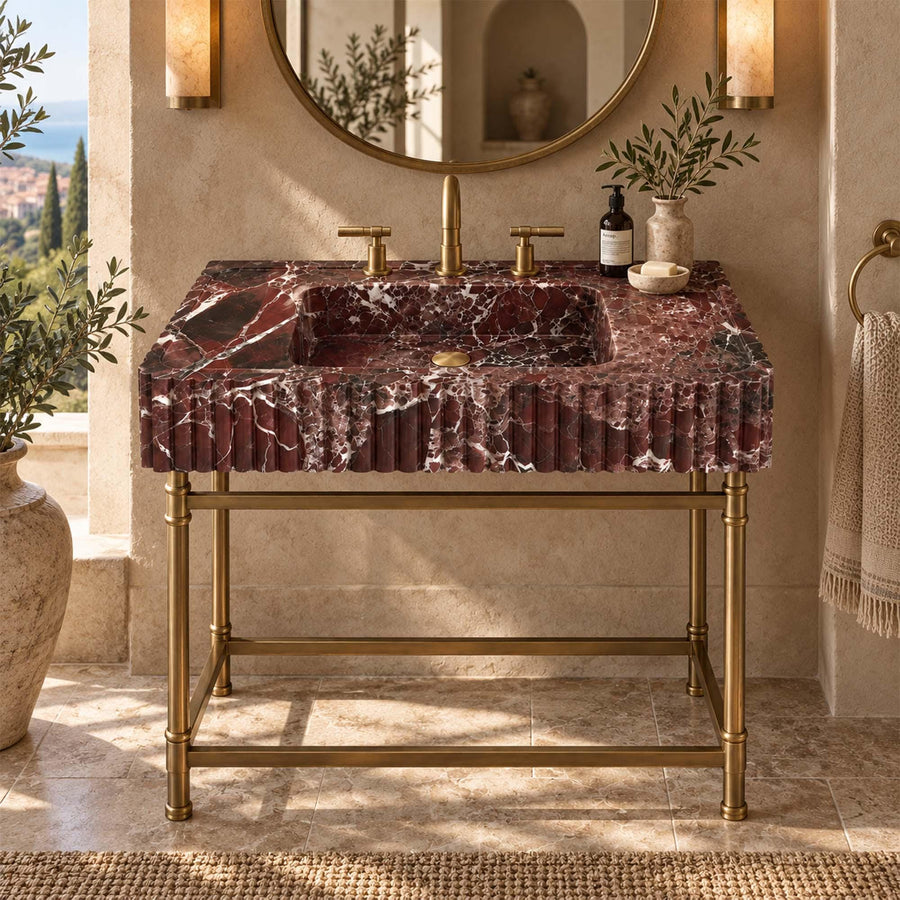 Angled view of a handcrafted Rosso Levanto bathroom sink