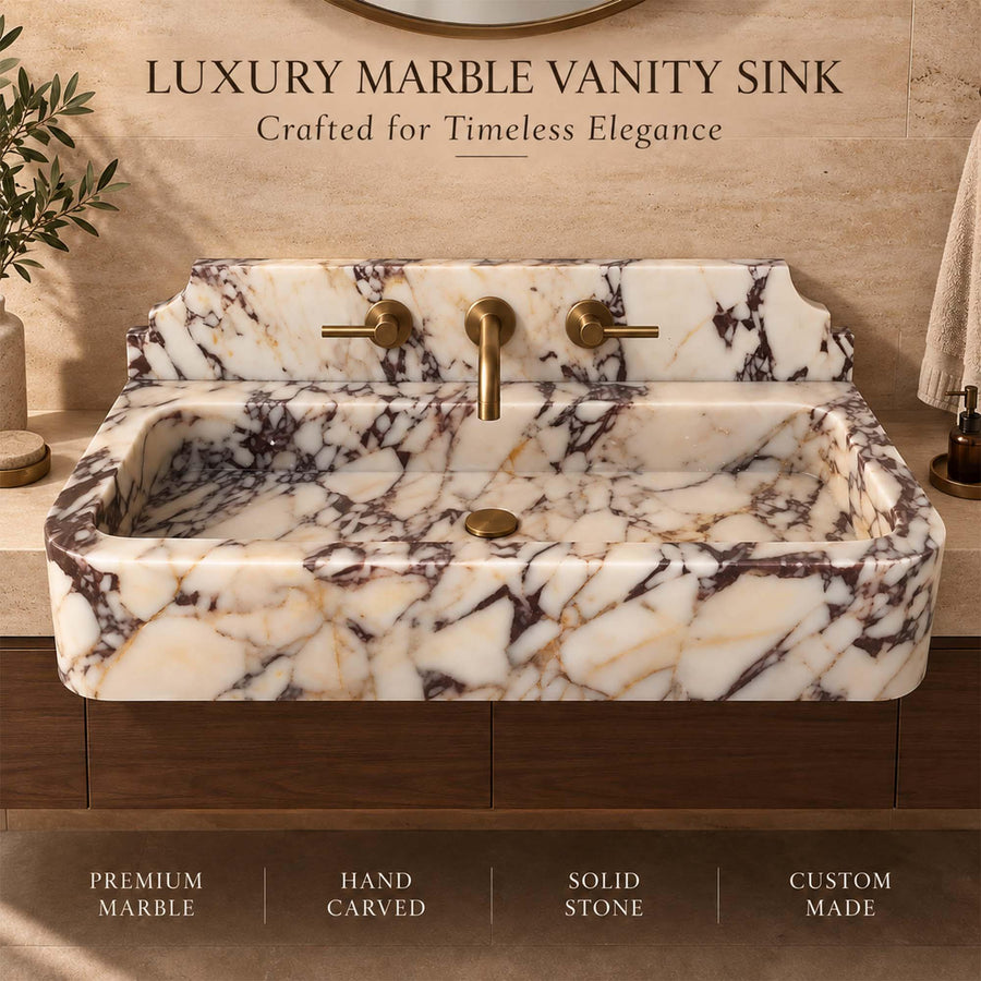 Front view of a hand-carved Calacatta Viola smooth console sink