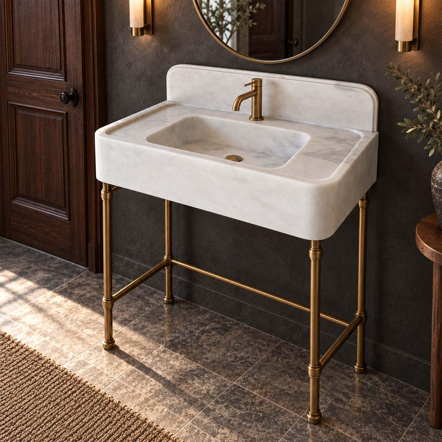 Carrara White marble console sink with integrated backsplash styled in a designer powder room
