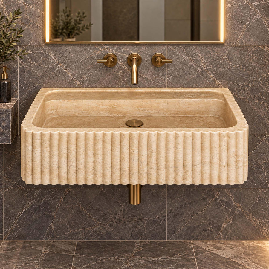Natural stone fluted console sink in Beige Travertine with brass fittings