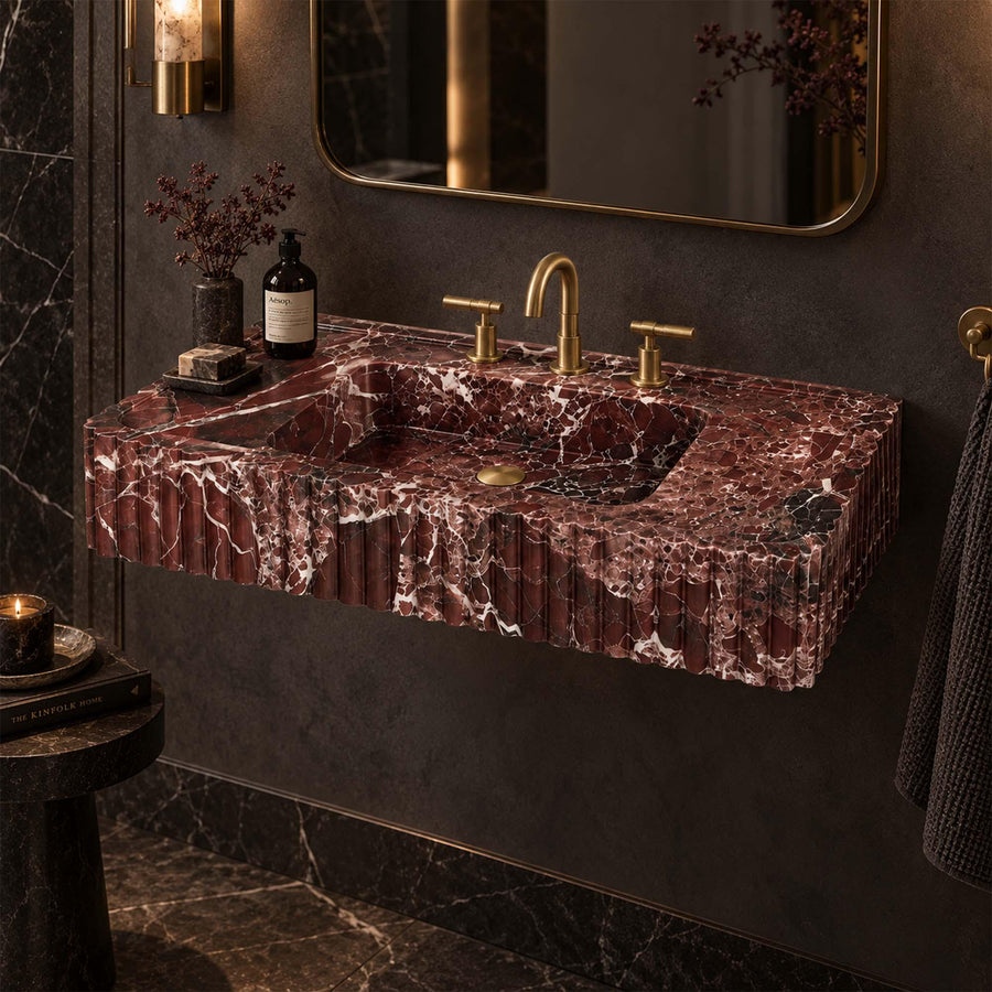 Rosso Levanto red marble fluted console sink styled in a designer powder room