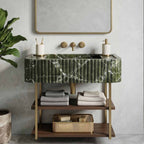 Bathroom vanity with green marble top, wooden shelves, and decorative items.