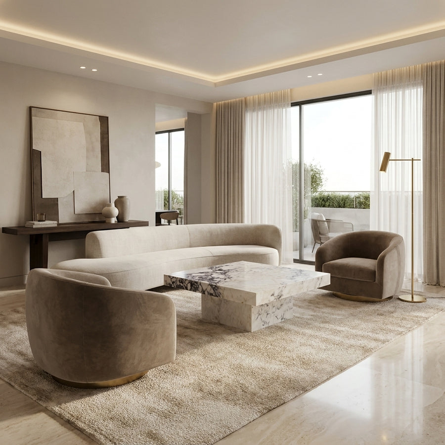 Modern living room with beige sofa, armchair, and marble coffee table.