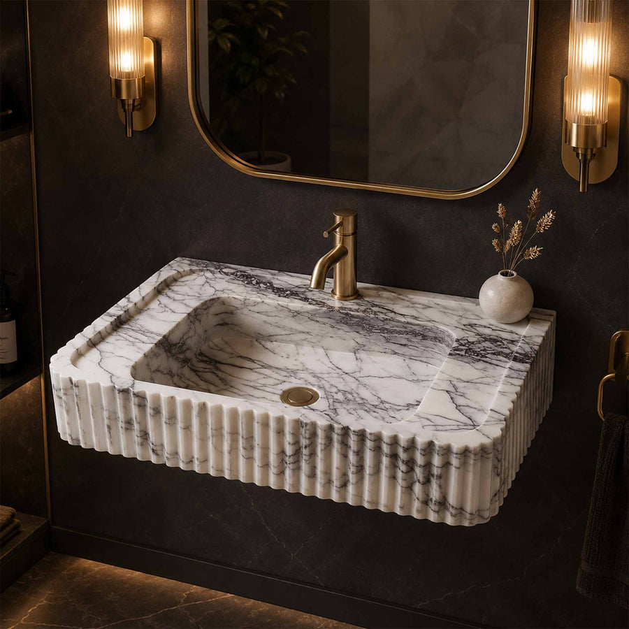 Marble sink with faucet in a bathroom setting