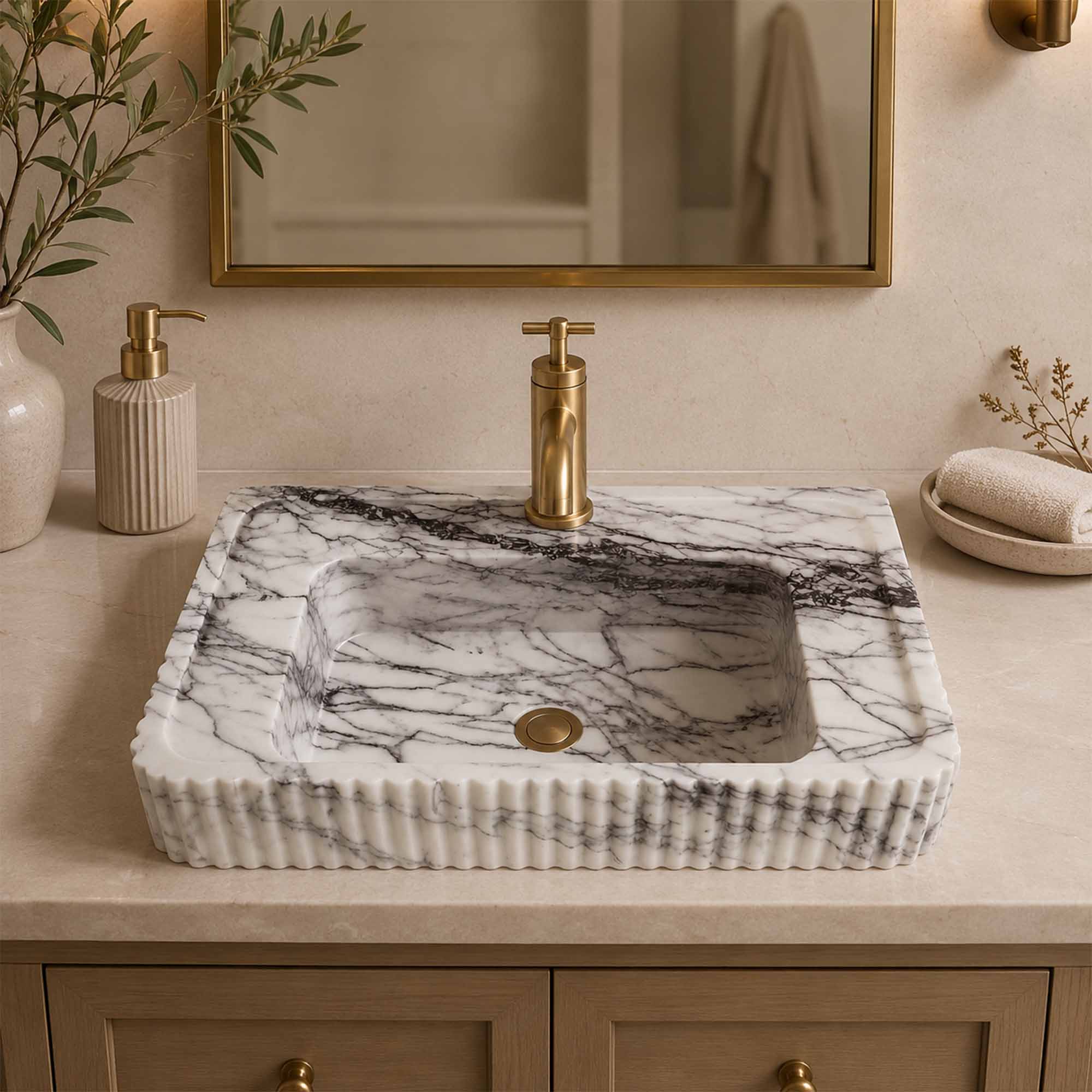 Marble sink with faucet in a bathroom setting