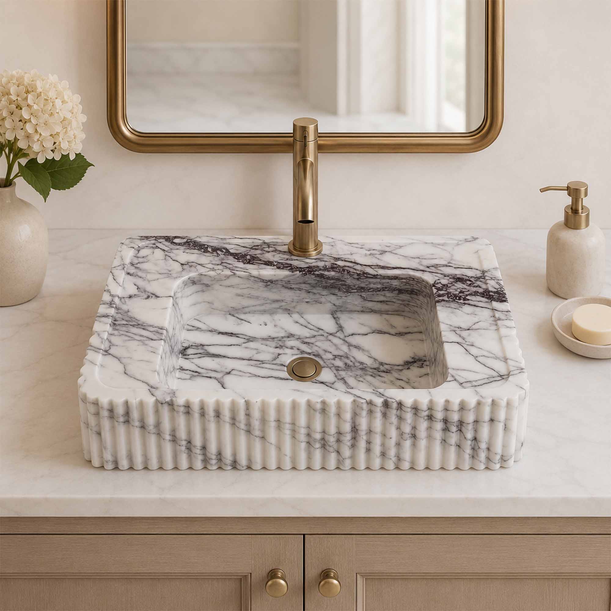 Marble sink with faucet in a bathroom setting