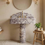 Calacatta viola marble sink with pedestal in a bathroom