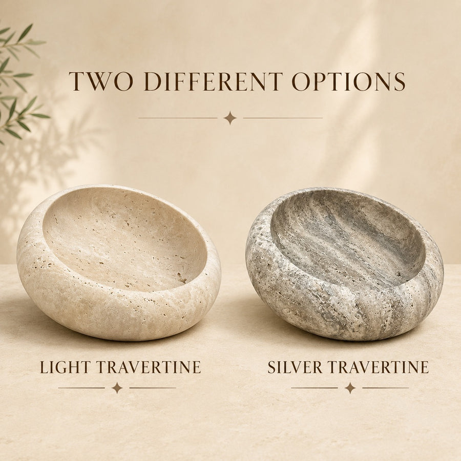 Two stone bowls shown side by side on a warm beige background with text reading 'TWO DIFFERENT OPTIONS' and labels 'LIGHT TRAVERTINE' and 'SILVER TRAVERTINE'.