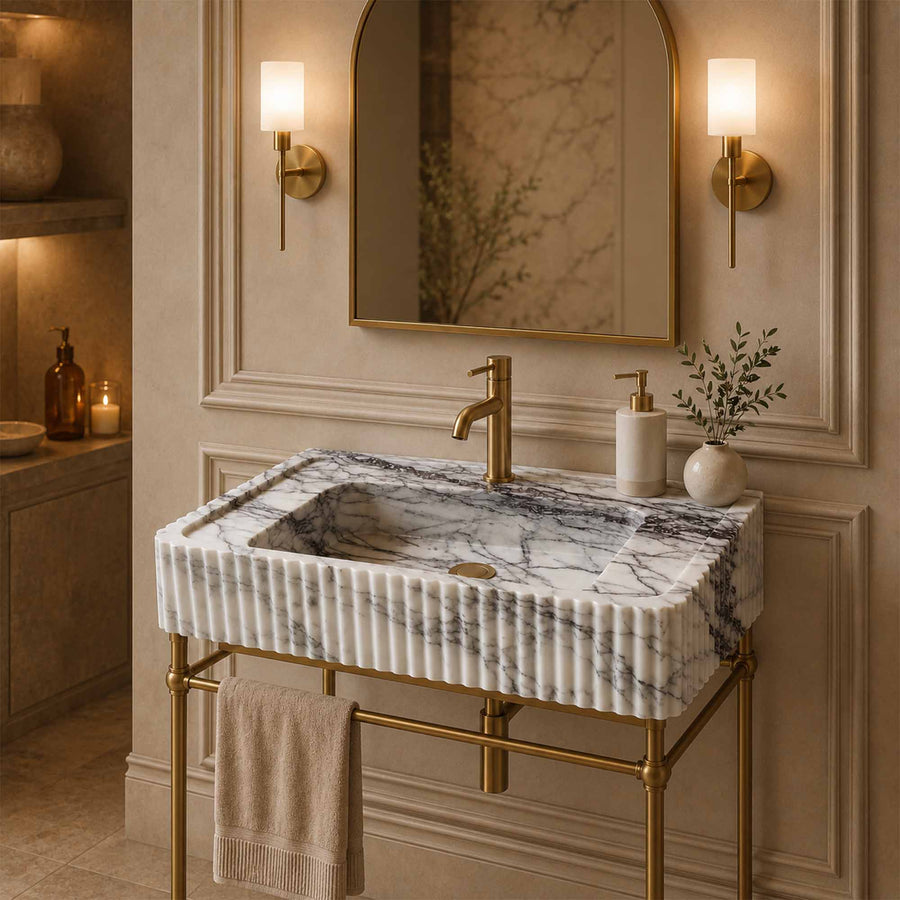 Marble sink with faucet in a bathroom setting