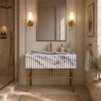 Marble sink with faucet and a brass stand  in a bathroom setting