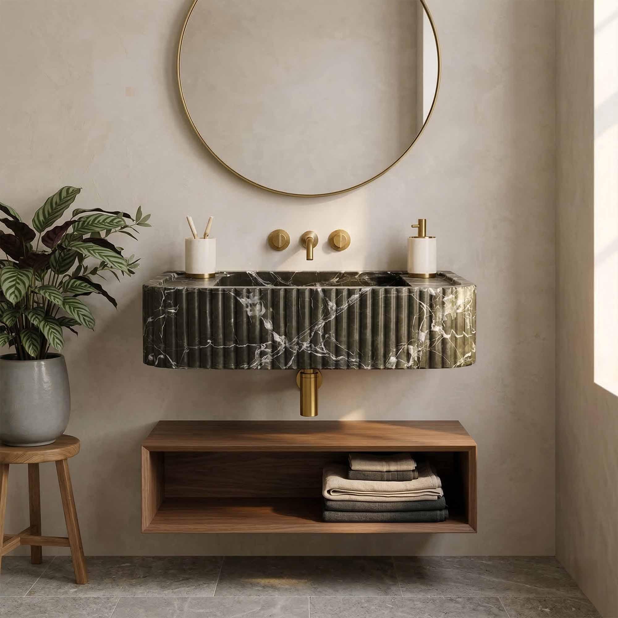 Bathroom with marble sink, wooden cabinet, and round mirror.