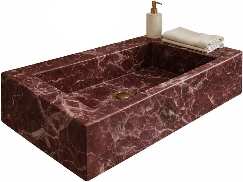 Rosso levanto marble sink with soap dispenser and towel on a white background