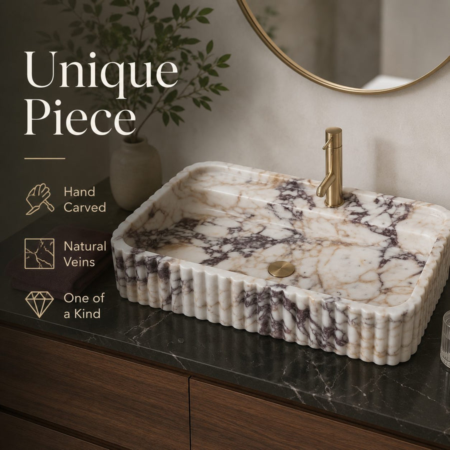 Calacatta Viola marble sink graphic — hand carved, natural veins, one of a kind