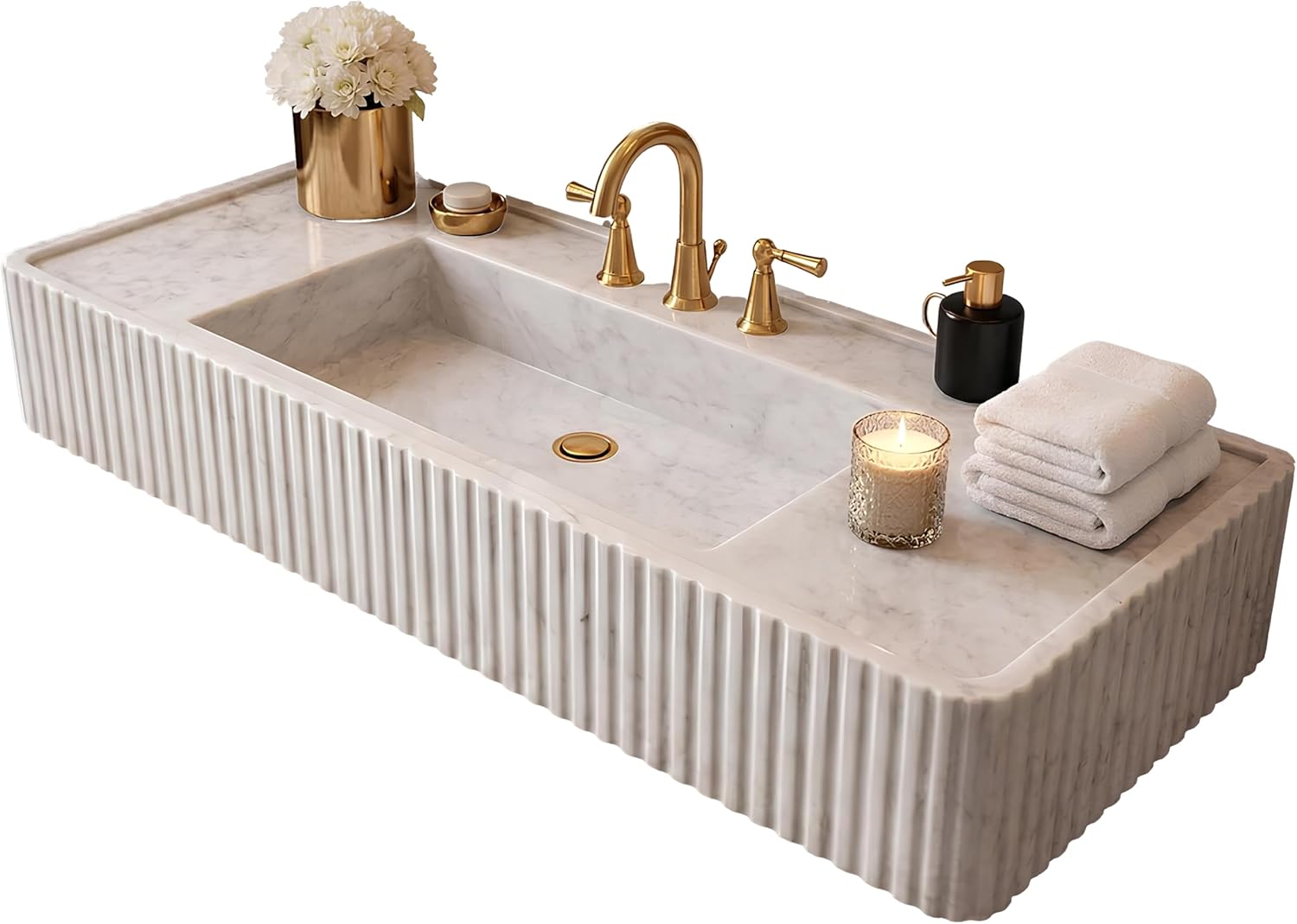 Marble sink with gold faucet, candles, and towels on a white background